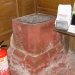 The font is solid sandstone and was made from the base of a Roman pillar.