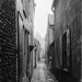 This photograph was taken in August 1896. It shows one of the Rows in Great Yarmouth. It gives a sense of just how dark and narrow they were, with open drains running down them. Here you can see also some of the people who lived in them. Although this photograph does not specify which row it is it is probably one of the ones leading up towards the church.