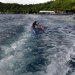 The local Tahitians ride the wake of our boat!