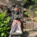 I believe that in Bali's Hindu culture, it is important to dress statues...and you see this everywhere in Bali.  Here, we see a guardian to a temple dressed in the familiar red and black checks.  These same checks are used for local security officials (real people).