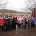 This is a picture of class four standing outside the flood defences that protect Croft!