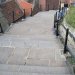 If you look carefully you will notice that some of the steps are much wider than others. This was apparently for resting a coffin on, in the days when the deceased were carried by friends and family up to the church. The Church Steps have long been part of Whitby. The earliest recorded evidence of them is a painting of 1717, although they no doubt existed long before this. Today there are 199 steps.

Geocaching Co-ordinates: N54°29.320 W000°36.642